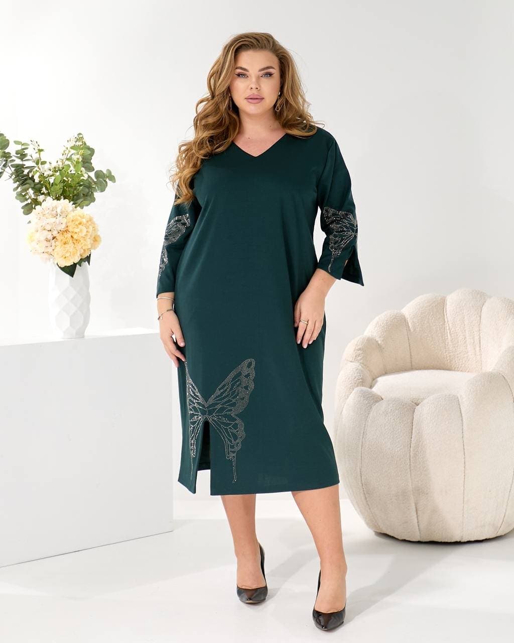 Жіноче трикотажне плаття міді вільного крою колір смарагдовий