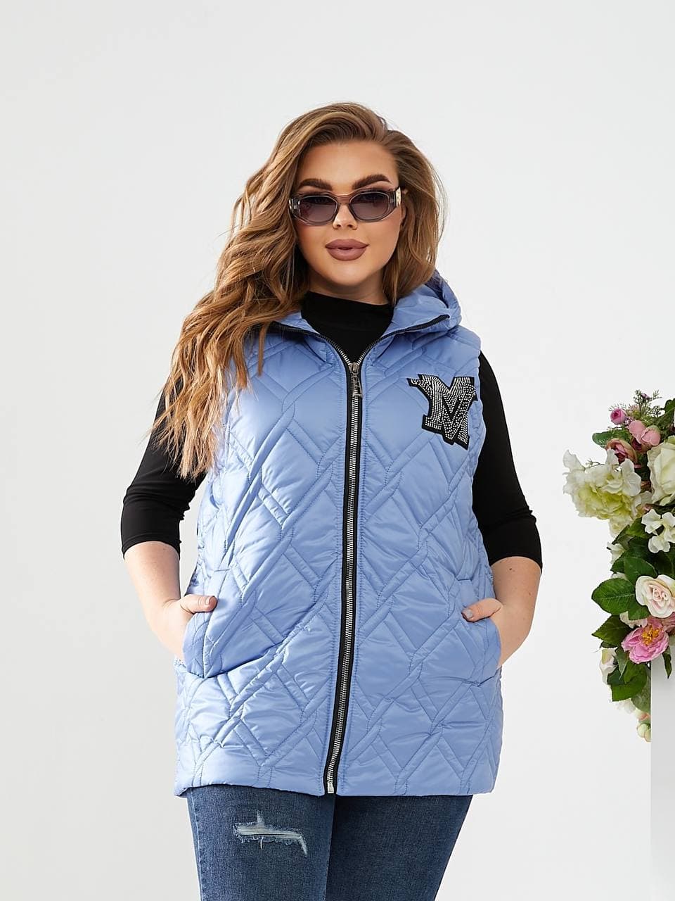 Жіночий весняний жилет блакитного кольору